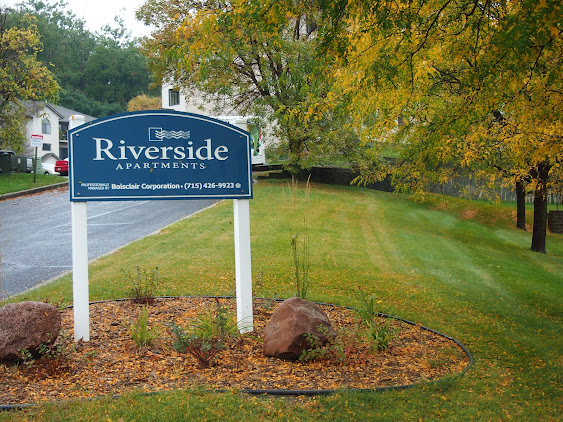 Riverside Apartments logo