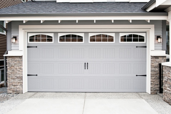 EM Garage Doors logo