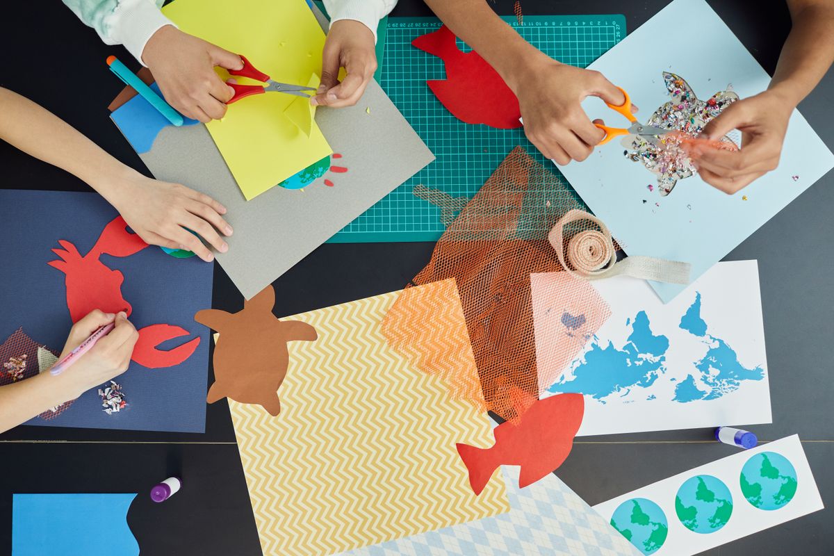 Young children drawing in a childcare classroom