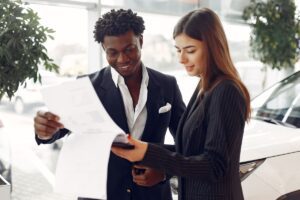 Client and adviser going through a written credit repair contract together