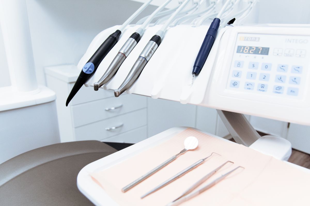 Set of sterilised dental instruments laid out ready for a patient appointment