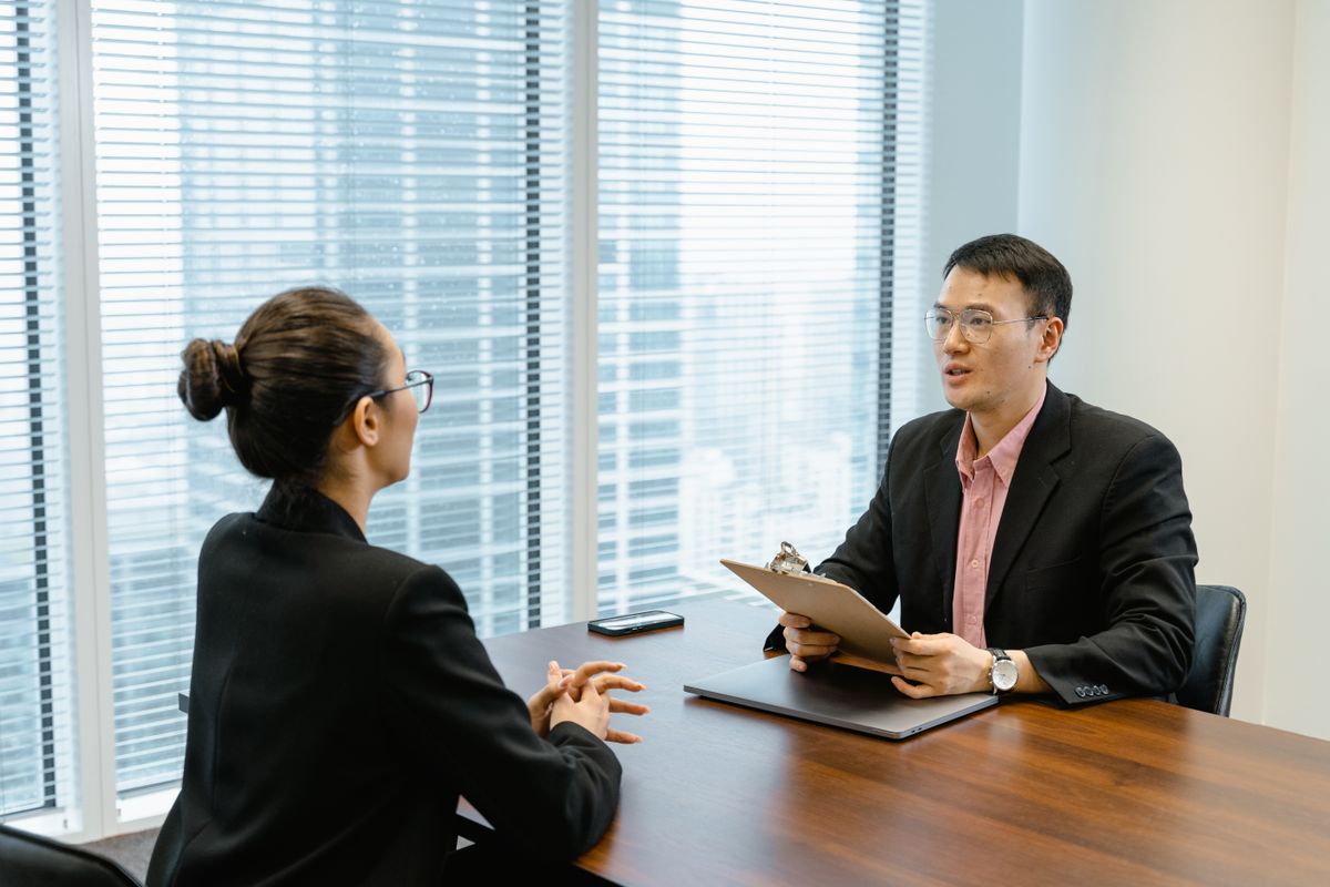 Discussing a case file and asking a lawyer about experience and fees