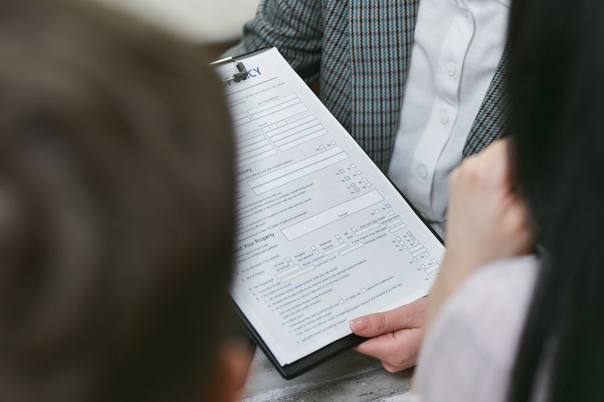 Holding a written services contract listing fees and cancellation terms