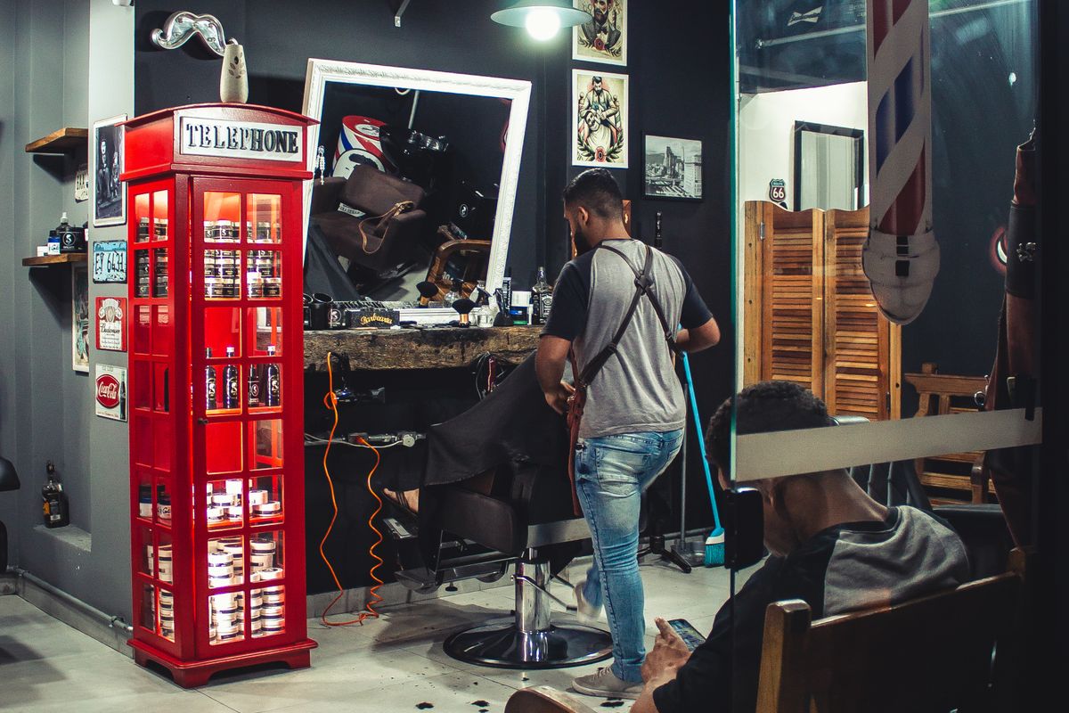 Interior of a modern barbershop with styling chairs and mirrors