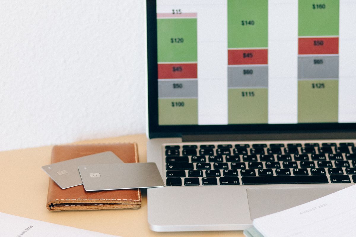 Disputing credit report errors from home using a laptop and paper statements