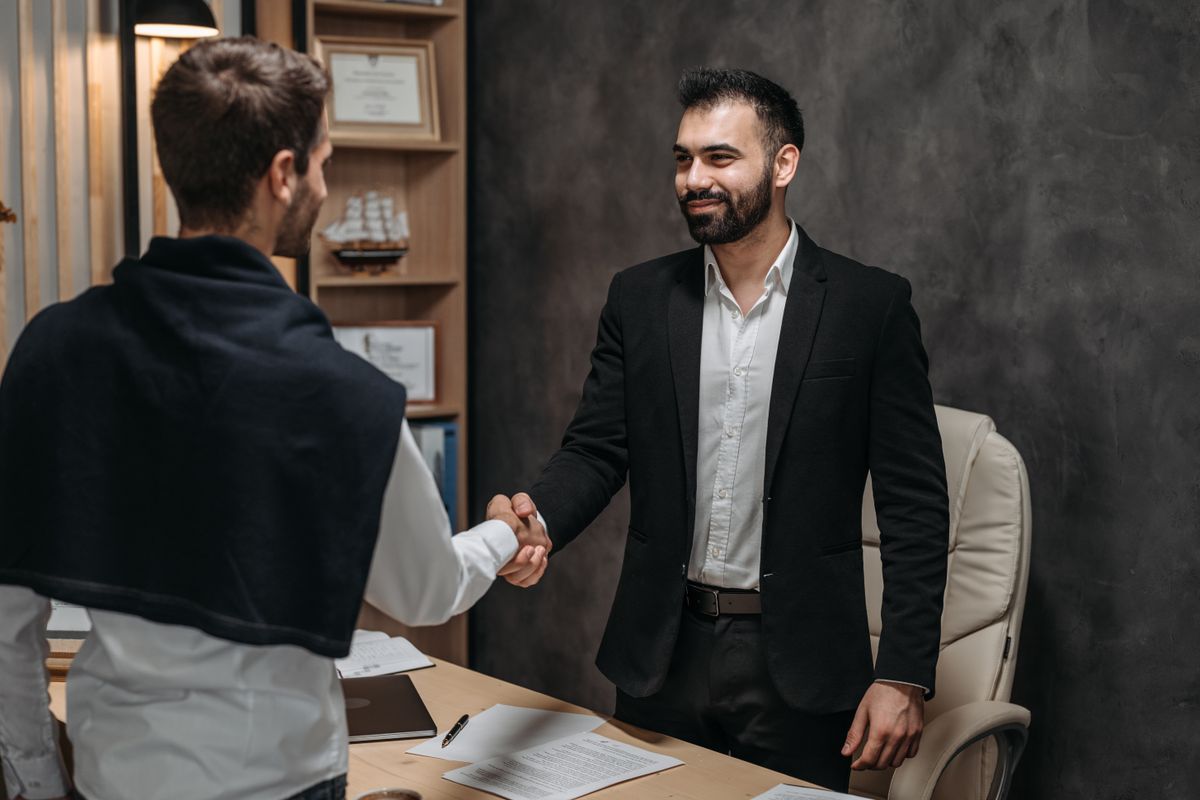 Going through a written retainer agreement before agreeing to hire a lawyer