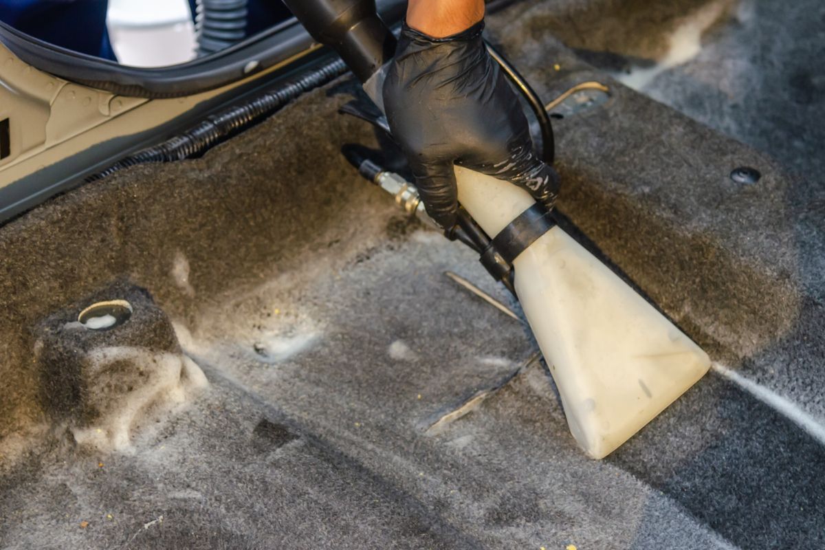 Vacuuming a car interior, included in even the most basic detailing package