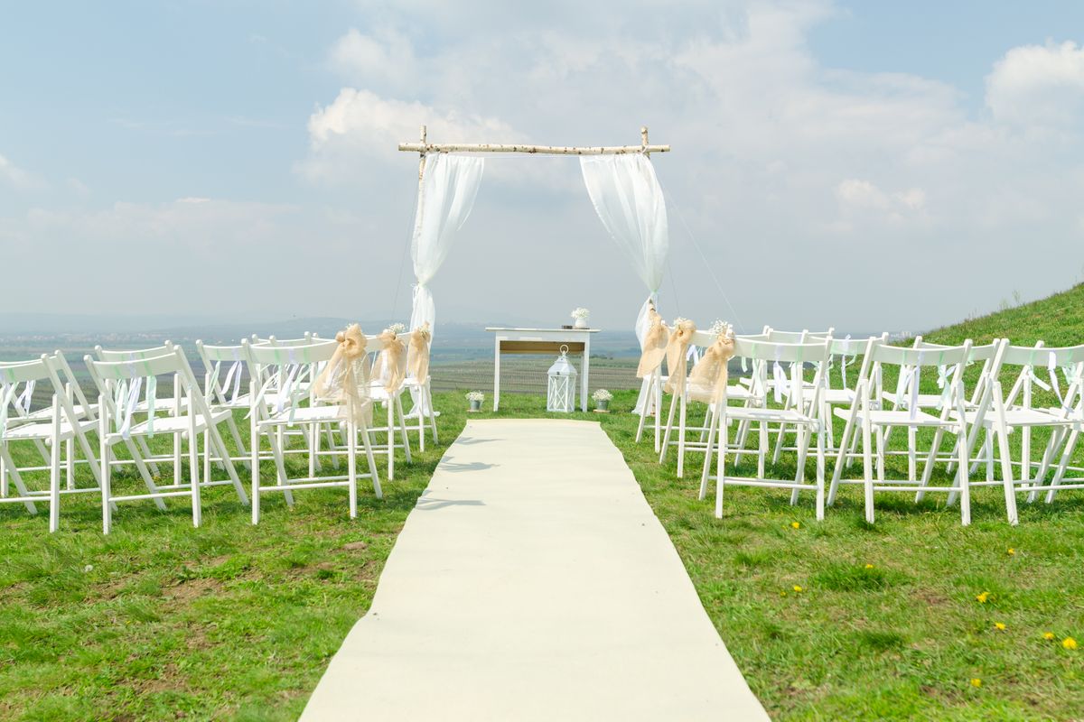 A reception space with lighting installed, one of the costs venues price separately