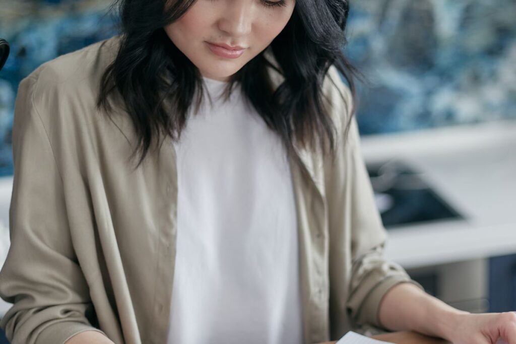 Working through household bills to decide between credit repair and debt settlement