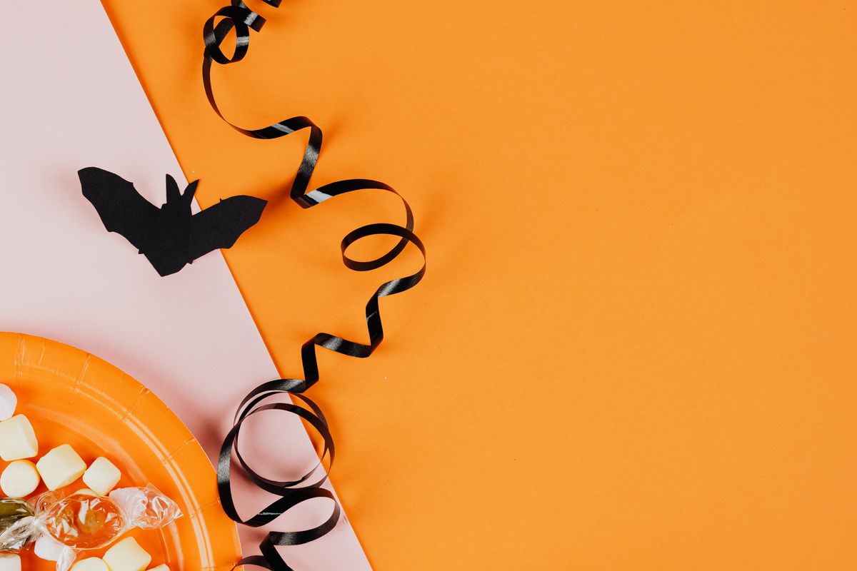 Halloween party table set with food and decorations
