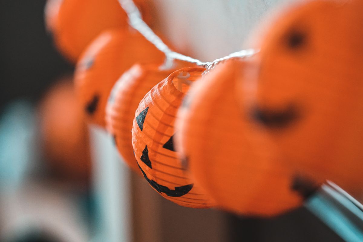 Carved pumpkin lanterns lit for Halloween
