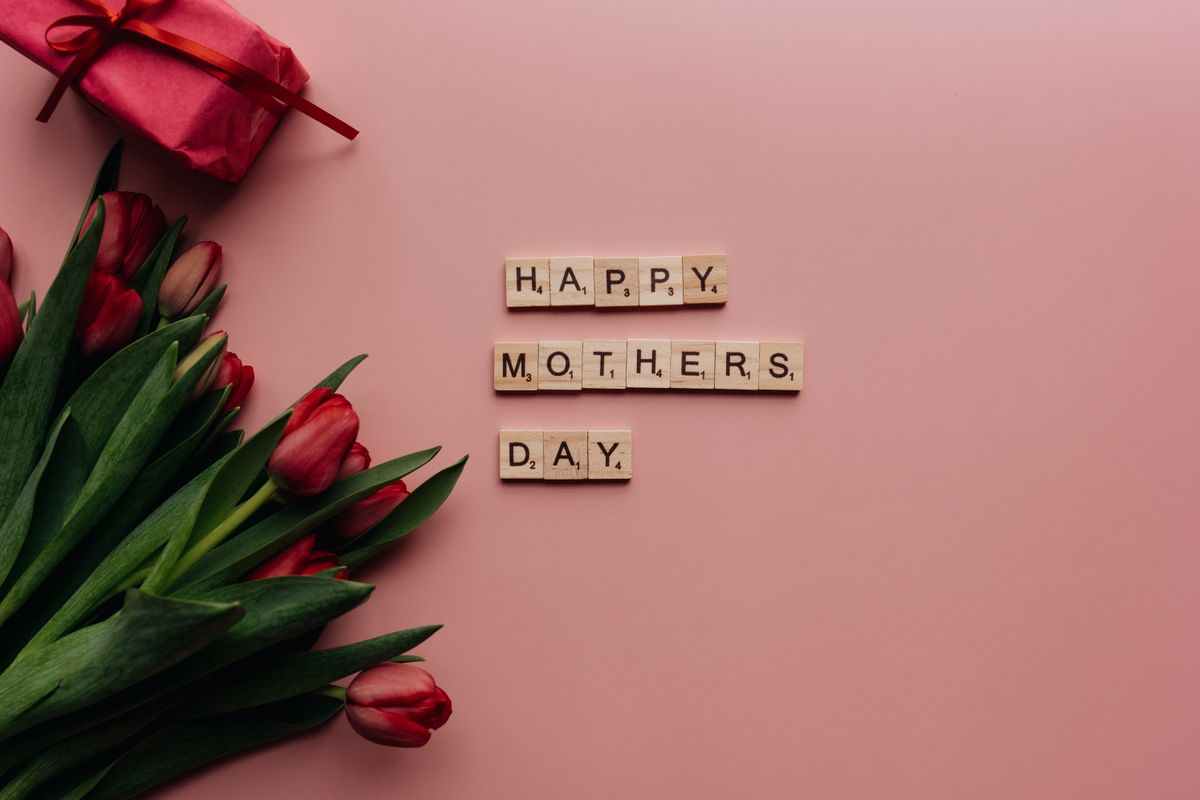 Family celebrating Mother's Day with grandmother